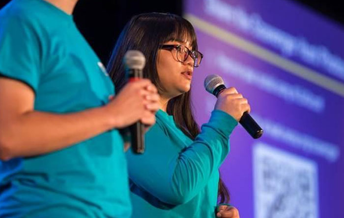 Crisostomo on stage during the general session